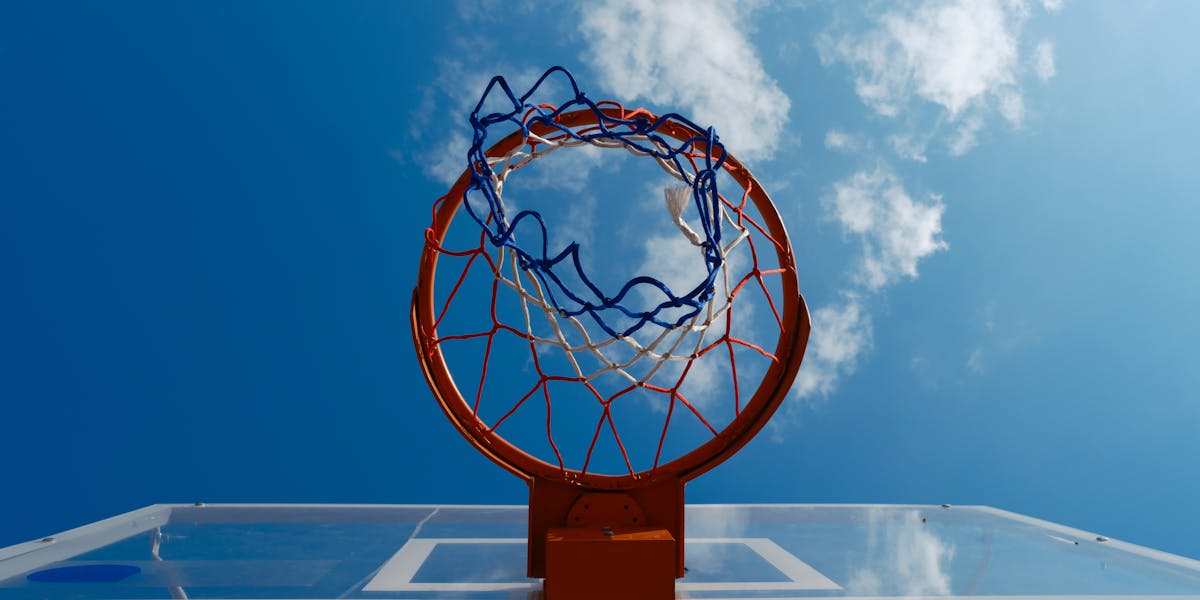 Youth basketball starter gear with ball and shoes