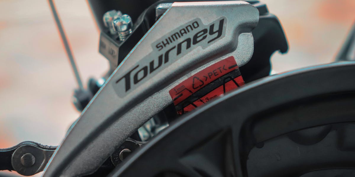 Detailed view of Shimano Tourney gear on a bicycle, highlighting mechanical precis...