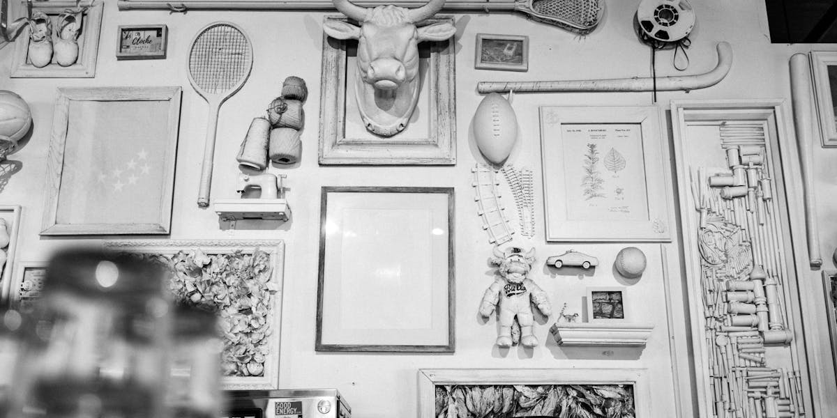 Competitive lacrosse match showing two players battling for control of the ball 