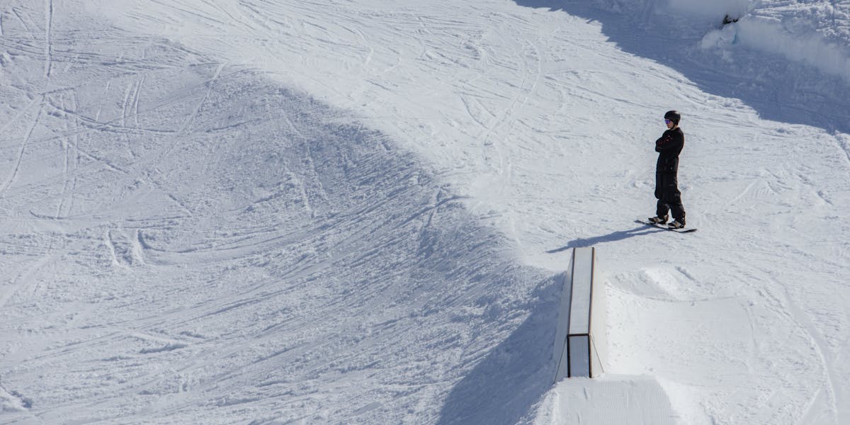 Detailed view of hockey players in action, showcasing ice skates and hockey gear