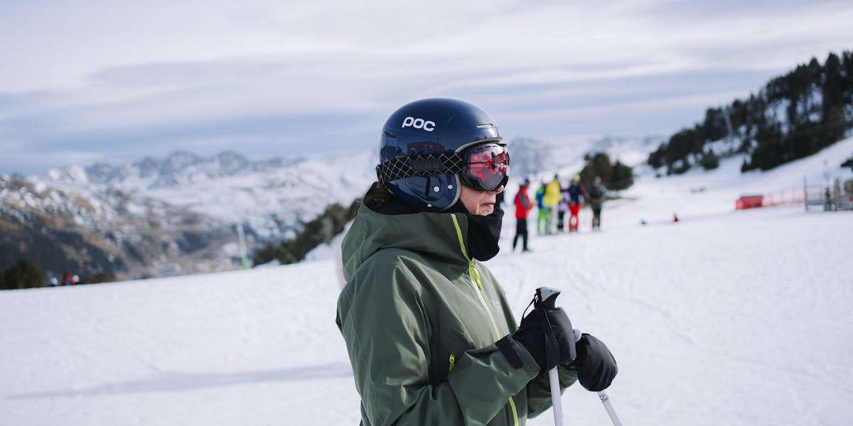 Top view of snowshoes in fresh powder snow during a winter hike under the sun.