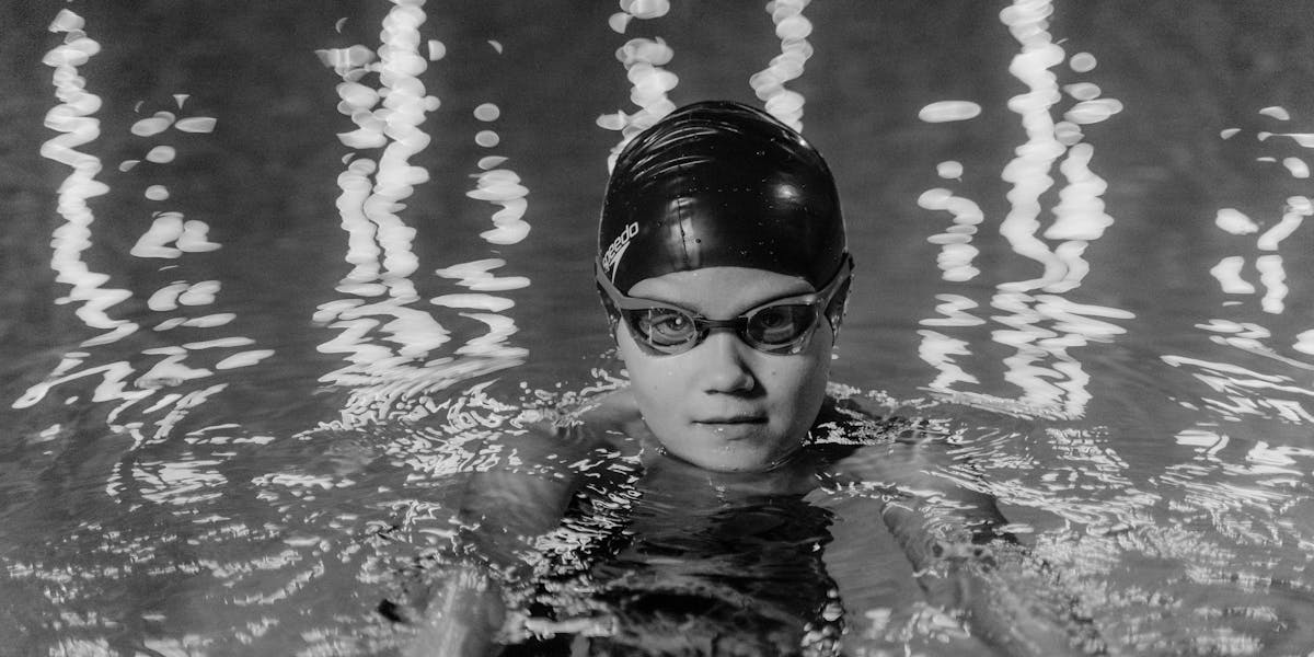 Swimmer with swim cap and goggles