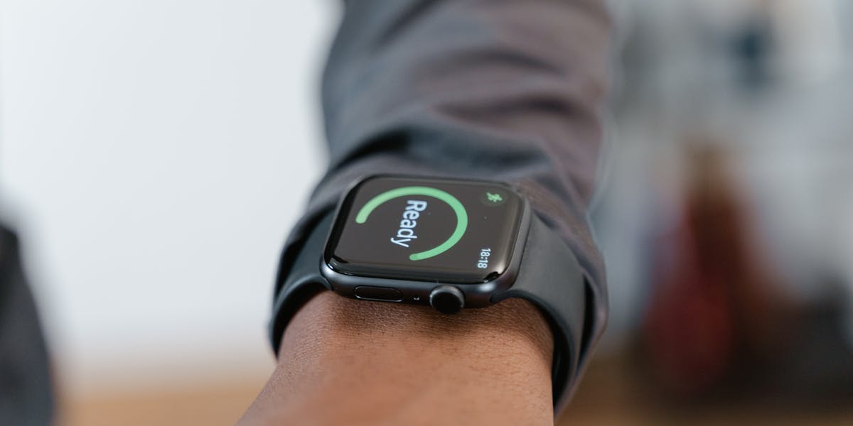 A close-up of a glass cup with 'All You Need is Love' text, ideal for lifestyle th...